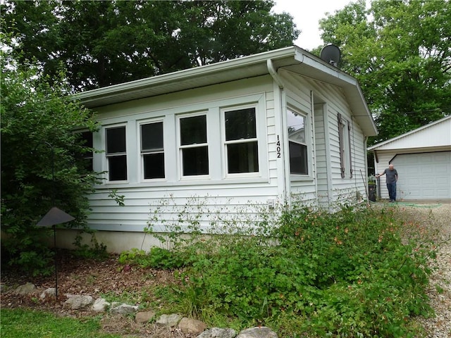 1402 Dean St, Danville, IL 61832 - view of side of home featuring an outdoor structure