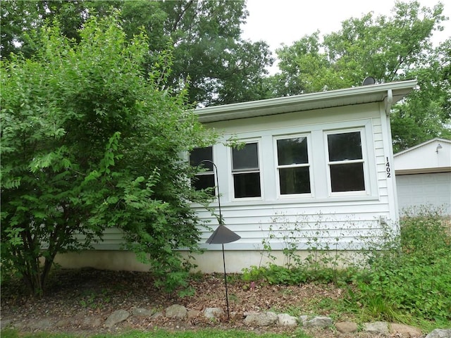 1402 Dean St, Danville, IL 61832 - view of home's exterior featuring a garage