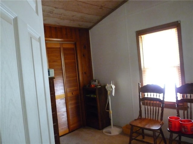 1402 Dean St, Danville, IL 61832 - sitting room featuring lofted ceiling, wooden walls, and wooden ceiling
