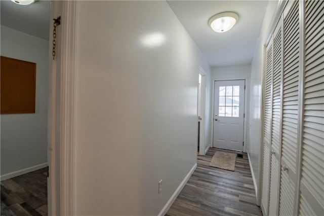 entryway with dark hardwood / wood-style floors