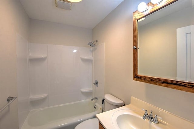 full bathroom featuring vanity, toilet, and washtub / shower combination