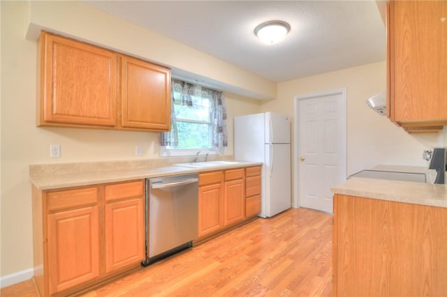 7 Mcdonald Ave, Forsyth, IL 62535 - kitchen featuring dishwasher, freestanding refrigerator, range, light wood-style flooring, and light countertops