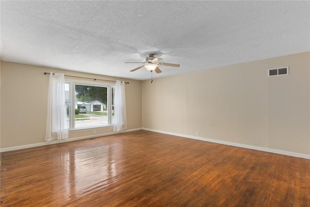 911 Saint Anthony Ave, Effingham, IL 62401 - empty room featuring wood finished floors, ceiling fan, and a textured ceiling