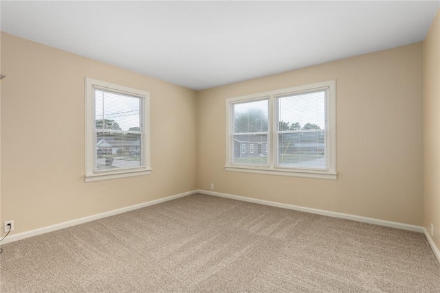 911 Saint Anthony Ave, Effingham, IL 62401 - unfurnished room with carpet floors and healthy amount of natural light