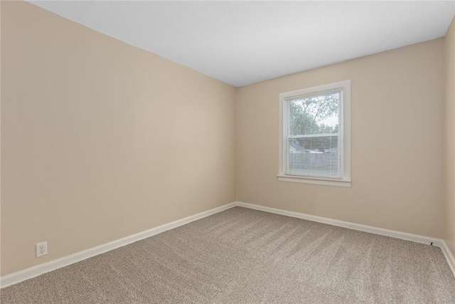 911 Saint Anthony Ave, Effingham, IL 62401 - carpeted empty room featuring baseboards