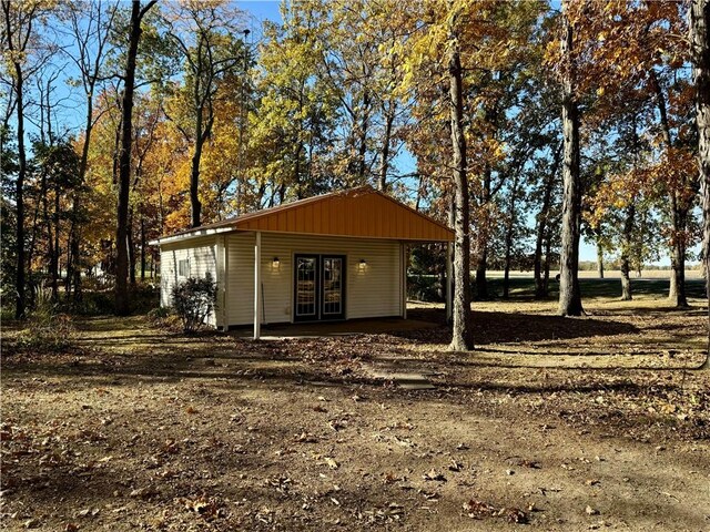 view of outbuilding featuring french doors