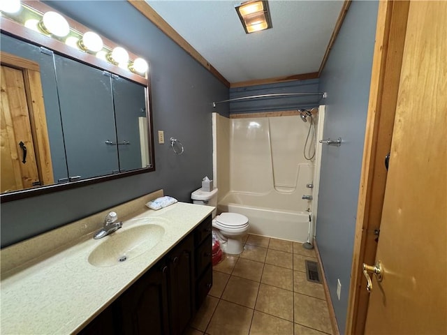 full bathroom featuring toilet, shower / bathing tub combination, crown molding, tile patterned floors, and vanity