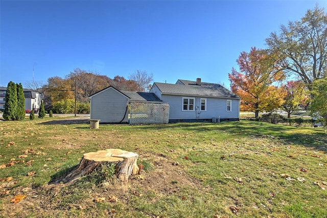 exterior space with a yard and cooling unit