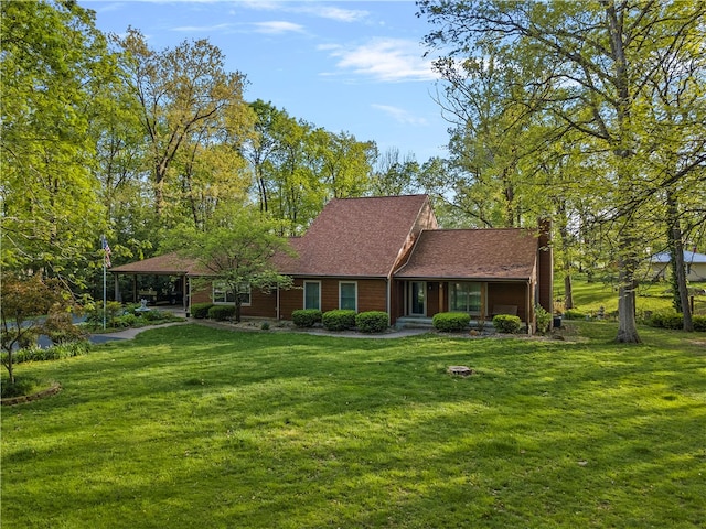 ranch-style home with a front lawn