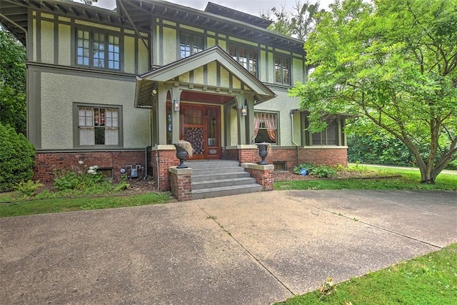 580 Powers Ln, Decatur, IL 62522 - view of front of home with stucco siding and brick siding