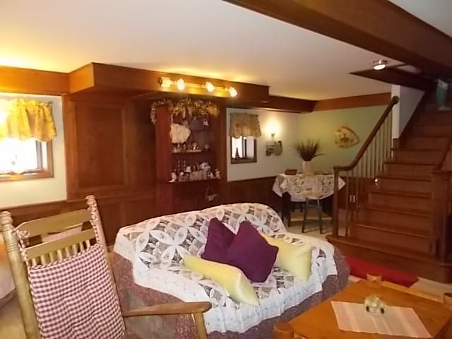 living room featuring beam ceiling