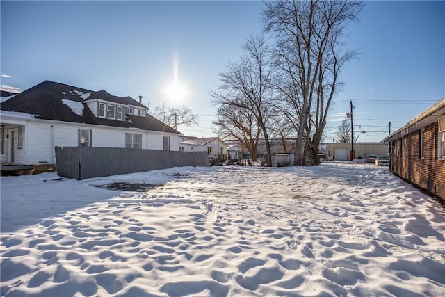 view of yard layered in snow