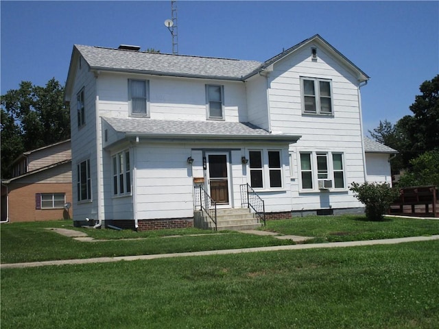 506 W 5th St, Pana, IL 62557 - traditional-style home with entry steps, roof with shingles, and a front yard