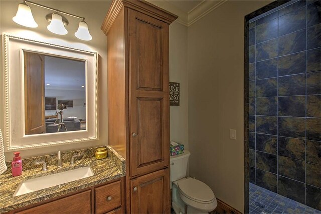 2125 Reserve Way, Decatur, IL 62521 - full bath with a tile shower, toilet, ornamental molding, and vanity