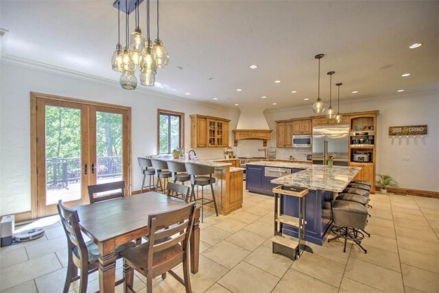 2125 Reserve Way, Decatur, IL 62521 - dining area featuring french doors, recessed lighting, ornamental molding, light tile patterned floors, and baseboards