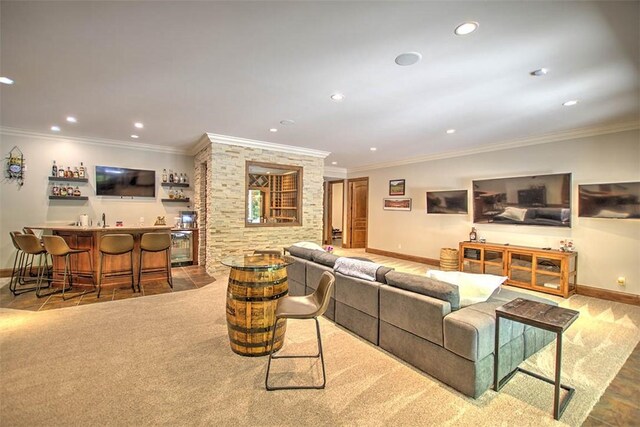 2125 Reserve Way, Decatur, IL 62521 - living area with wet bar, baseboards, recessed lighting, and crown molding