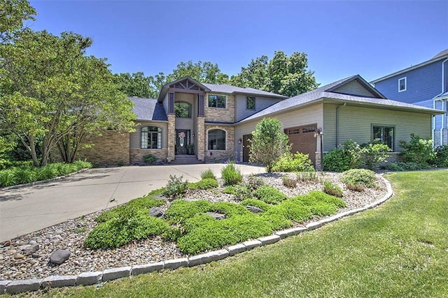 2125 Reserve Way, Decatur, IL 62521 - view of front of house featuring a garage, driveway, and a front lawn