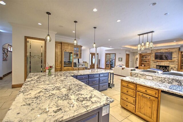 2125 Reserve Way, Decatur, IL 62521 - kitchen with open floor plan, a fireplace, light stone counters, recessed lighting, and crown molding