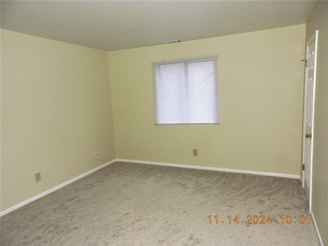 empty room featuring carpet floors