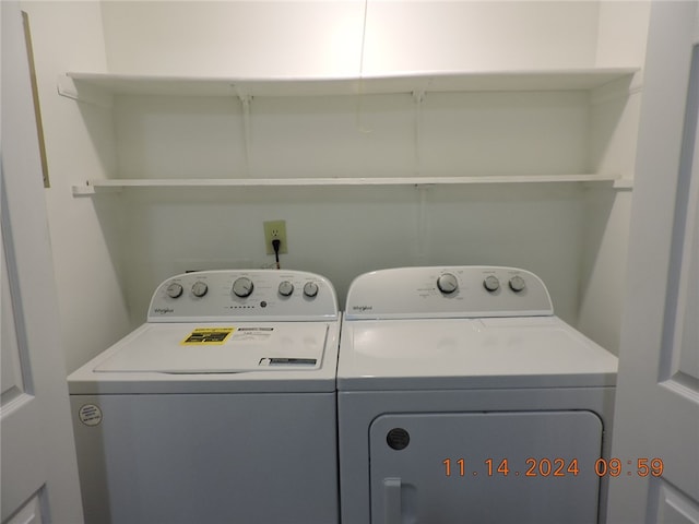 laundry room featuring separate washer and dryer