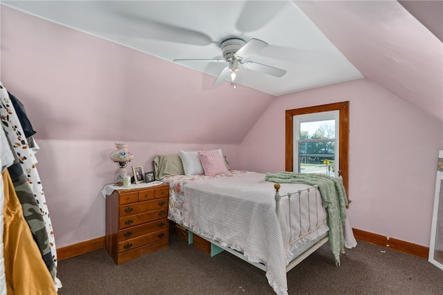 bedroom featuring dark colored carpet, ceiling fan, and vaulted ceiling