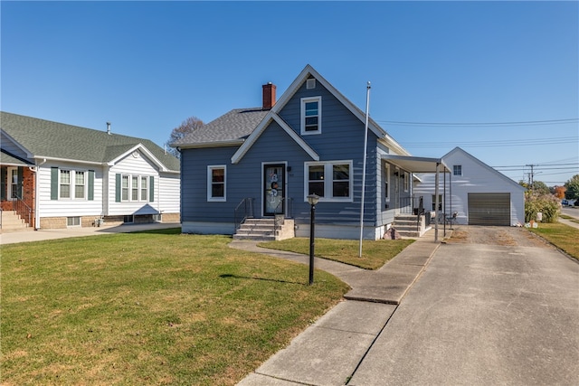 bungalow with an outbuilding, a front yard, and a garage