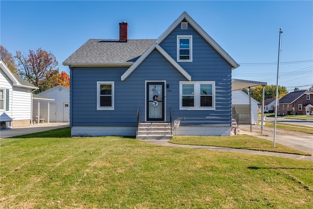 bungalow-style house with a front lawn