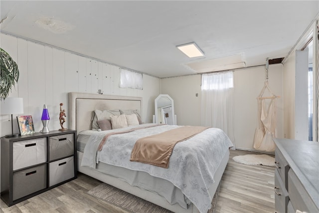 bedroom featuring light hardwood / wood-style floors