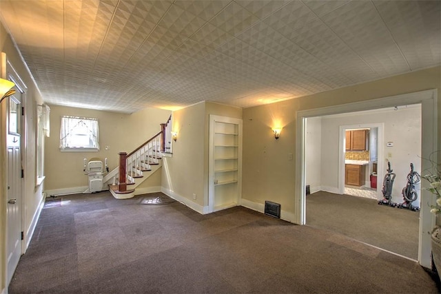 1591 Decatur St, Decatur, IL 62522 - unfurnished room featuring stairway and baseboards