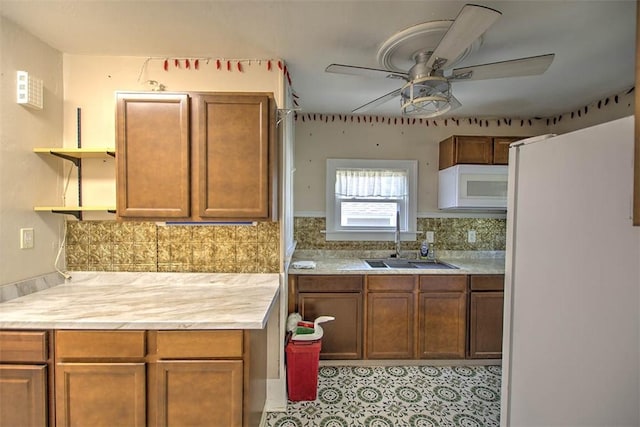 1591 Decatur St, Decatur, IL 62522 - kitchen with white appliances, open shelves, a ceiling fan, light countertops, and backsplash