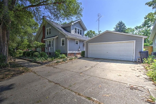 1591 Decatur St, Decatur, IL 62522 - view of front of house with a detached garage and an outbuilding
