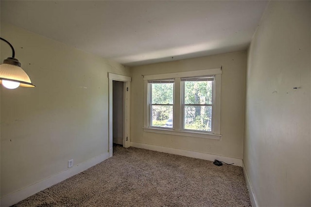 1591 Decatur St, Decatur, IL 62522 - empty room featuring baseboards and carpet floors