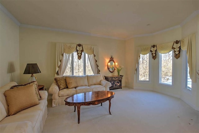 carpeted living room with plenty of natural light and crown molding