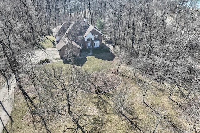 bird's eye view featuring a view of trees