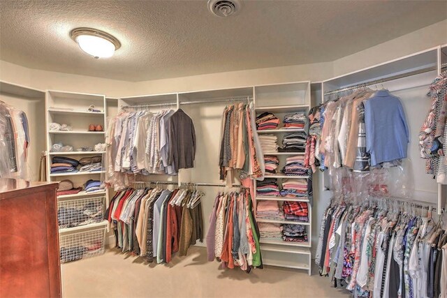 laundry room featuring a sink, cabinet space, recessed lighting, and washer and clothes dryer