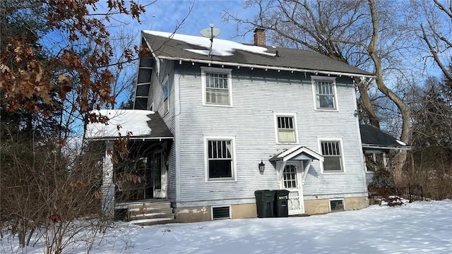 view of front of house with a chimney