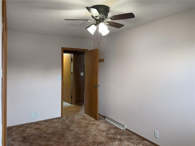 1511 E Fayette Ave, Teutopolis, IL 62467 - empty room featuring carpet flooring and a ceiling fan