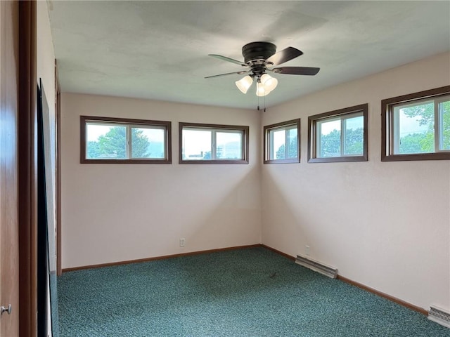 1511 E Fayette Ave, Teutopolis, IL 62467 - empty room featuring carpet and a ceiling fan