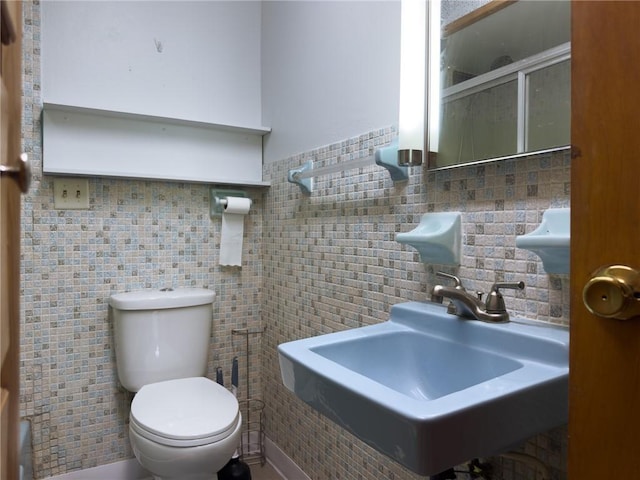 1511 E Fayette Ave, Teutopolis, IL 62467 - bathroom featuring tile walls, a stall shower, and decorative backsplash