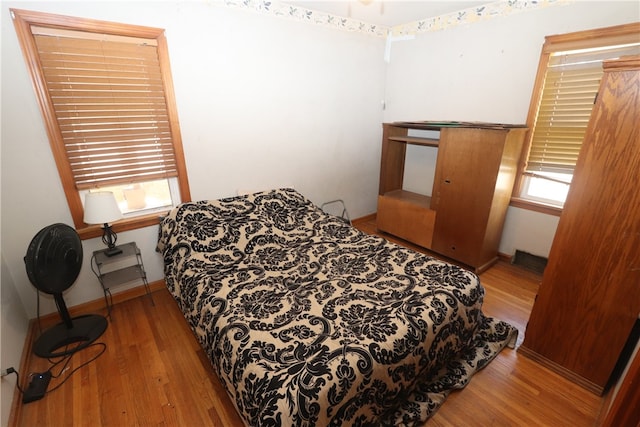 bedroom featuring light wood-type flooring