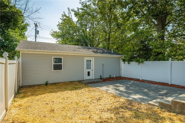 rear view of property featuring a patio