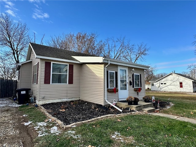 view of front of house with a front lawn