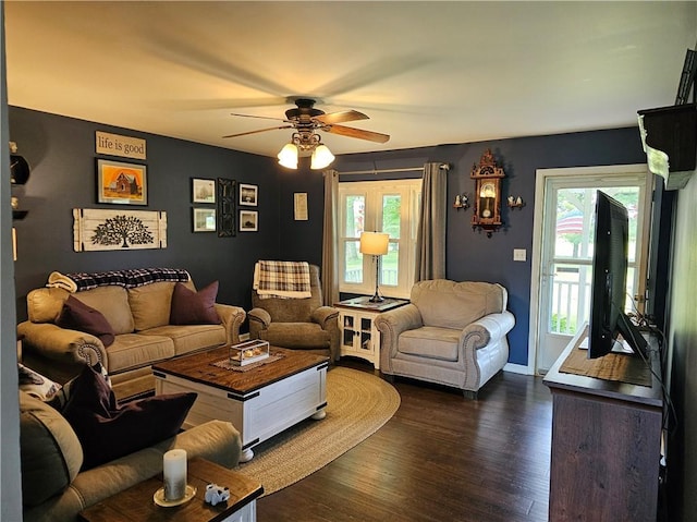 308 S Missouri St, Toledo, IL 62468 - living area with a ceiling fan, dark wood-style flooring, and healthy amount of natural light