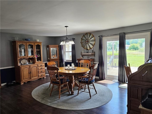 308 S Missouri St, Toledo, IL 62468 - dining space featuring dark wood-style flooring and a chandelier