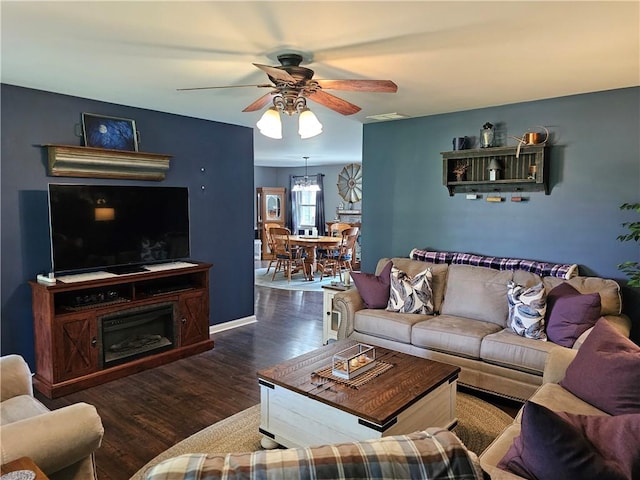 308 S Missouri St, Toledo, IL 62468 - living room featuring a ceiling fan and wood finished floors