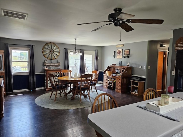 308 S Missouri St, Toledo, IL 62468 - dining room featuring a ceiling fan, a chandelier, and dark wood finished floors