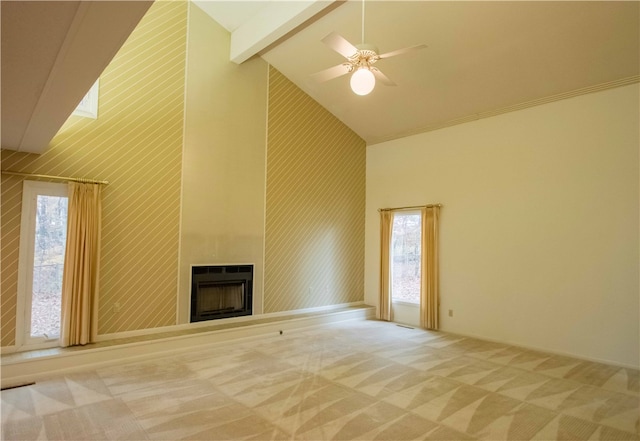 unfurnished living room featuring beamed ceiling, light colored carpet, a fireplace, and high vaulted ceiling