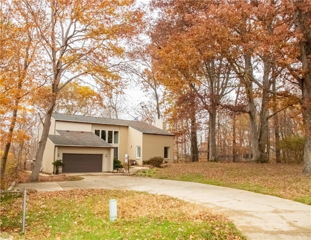 view of front of property with a garage