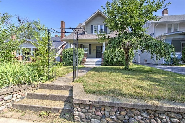 1470 W Decatur St, Decatur, IL 62522 - view of front of home with a front yard and a porch