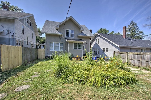 1470 W Decatur St, Decatur, IL 62522 - rear view of house featuring a fenced backyard